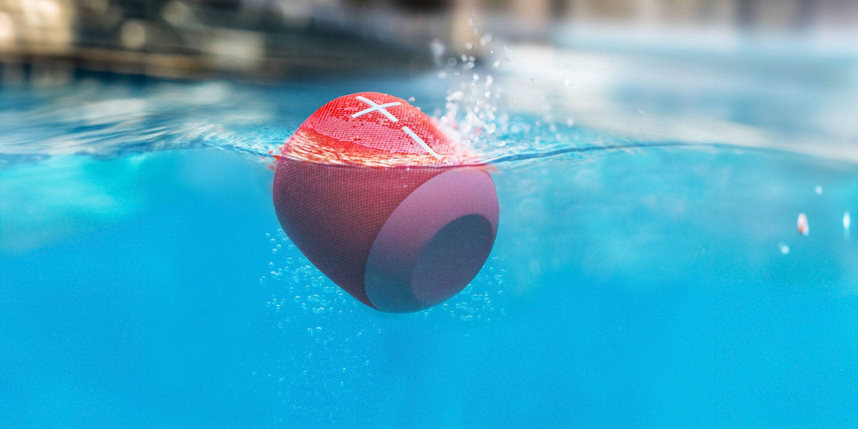 overmoulded Wonderboom waterproof speaker in a pool 